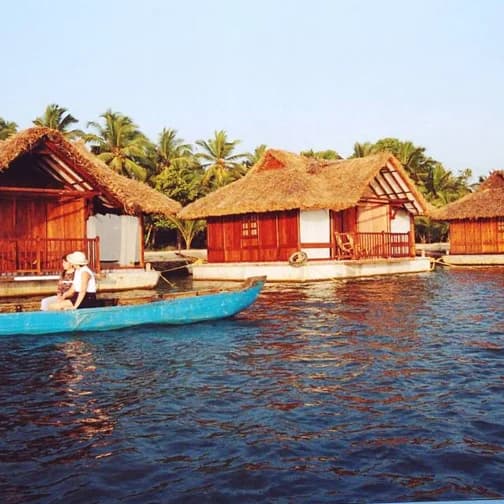 Traditional houseboat cruising in Poovar Kerala backwaters